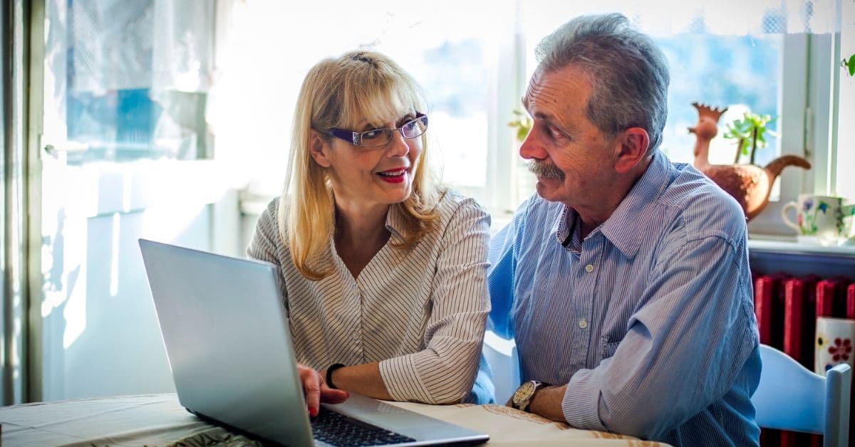 Two people researching probate lenders